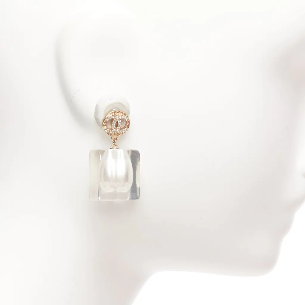 Chanel Encased Pearl Earrings White Pearl Never worn - Model View