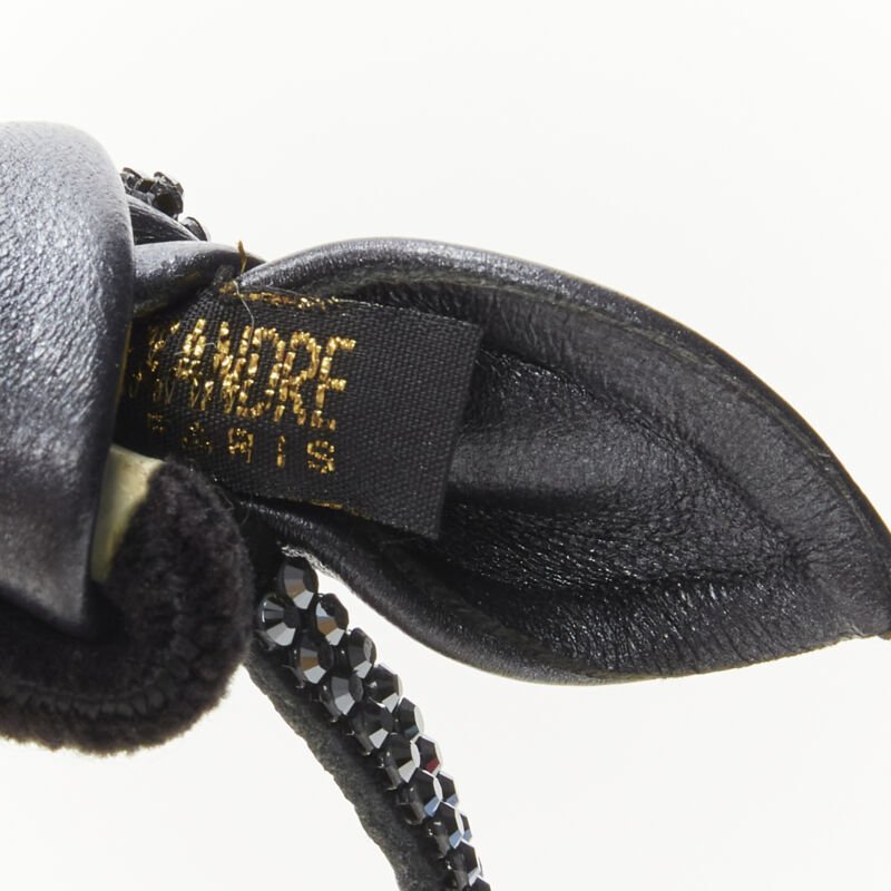 Unsigned / متعددة Silver Tassel Hair Tie - Side view