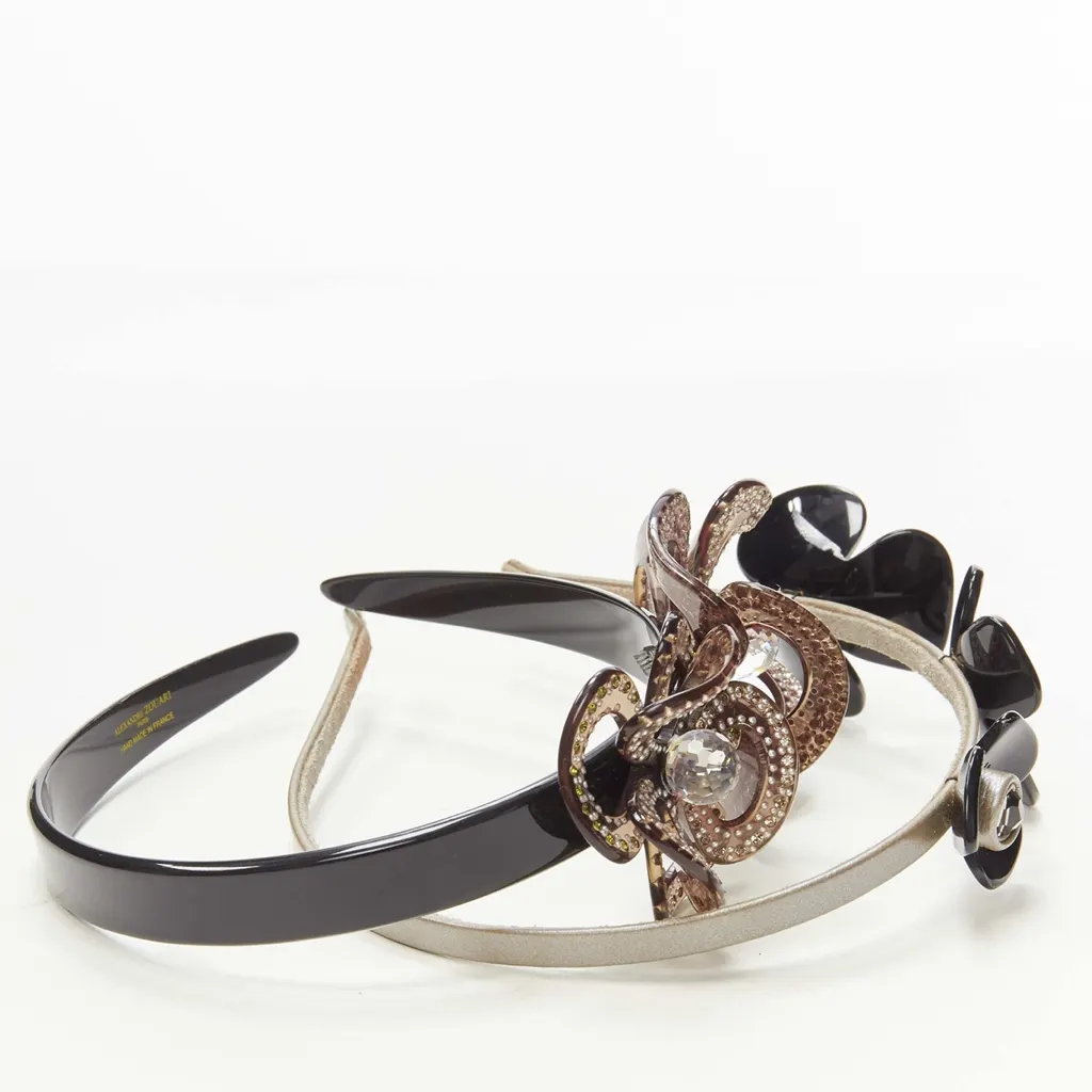 Unsigned Layered Flower Band Black Plastic Very good - Back View
