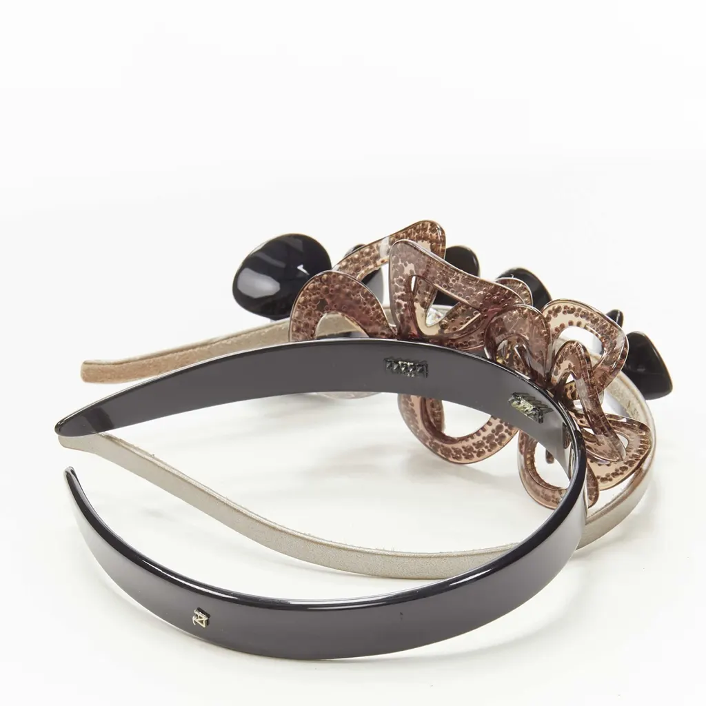 Unsigned Layered Flower Band Black Plastic Very good - Inside View