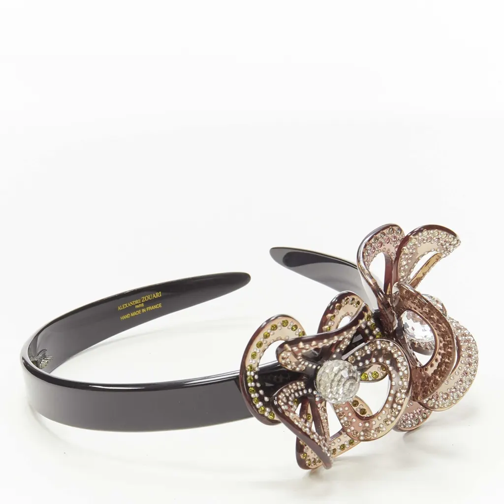 Unsigned Layered Flower Band Black Plastic Very good - Box View