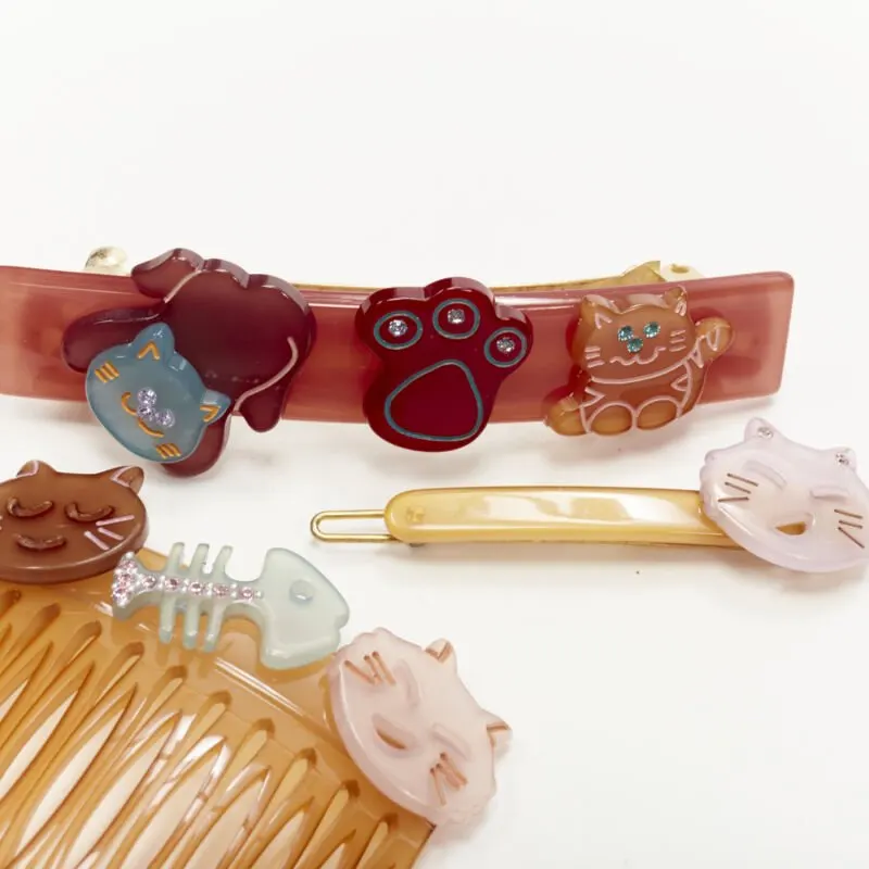 Unsigned Crystal Hair Comb Red Plastic Never worn - Model View