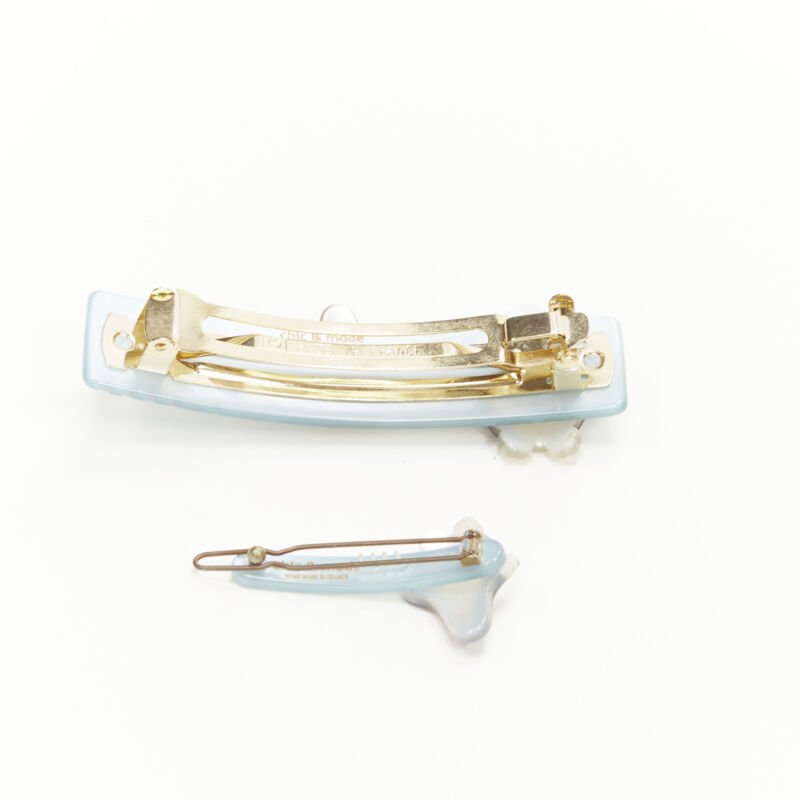 Unsigned / متعددة Penguin Hair Clips - Back view