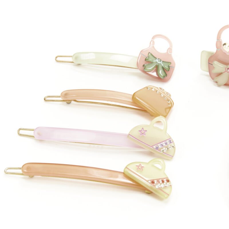 Unsigned / متعددة Bow Hair Clips - Side view