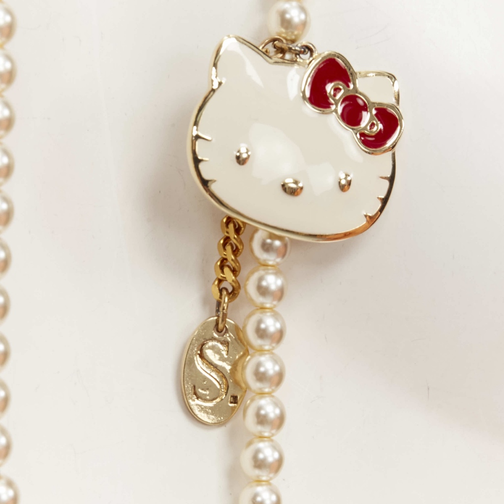 Unsigned / متعددة Hello Kitty Necklace - Back view