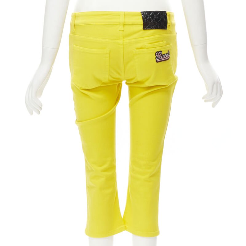 Gucci Yellow Logo Knee Jeans