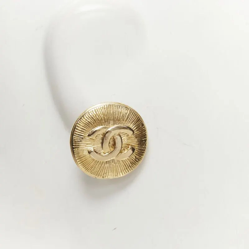 Chanel Starburst Clip Earrings Gold Metal Very good - Model View