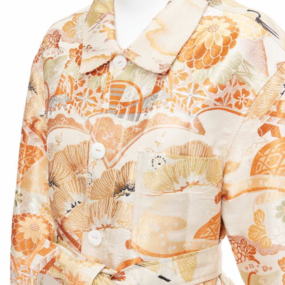 Unsigned / متعددة Orange Crane Jacquard Coat - Back view