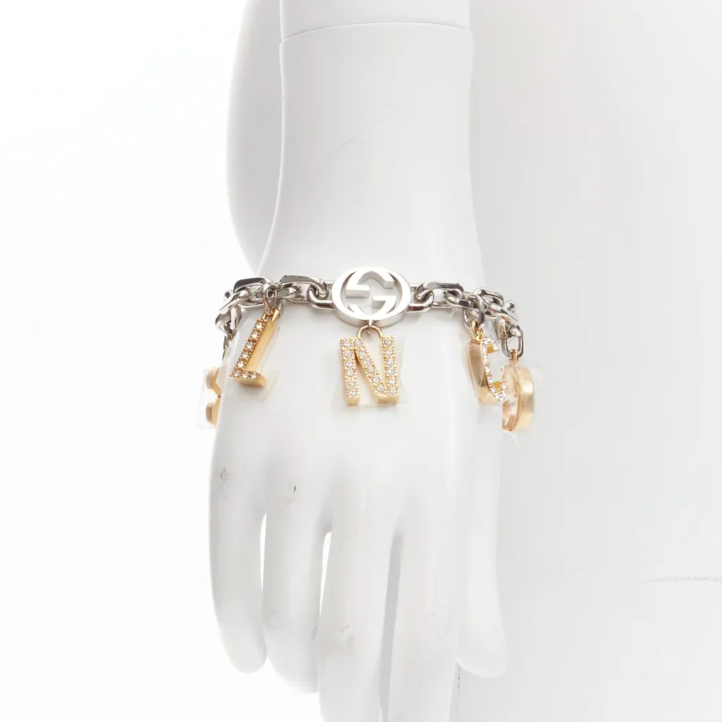 Gucci Gold Silver Charms Bracelet Silver Metal Never worn - Front View