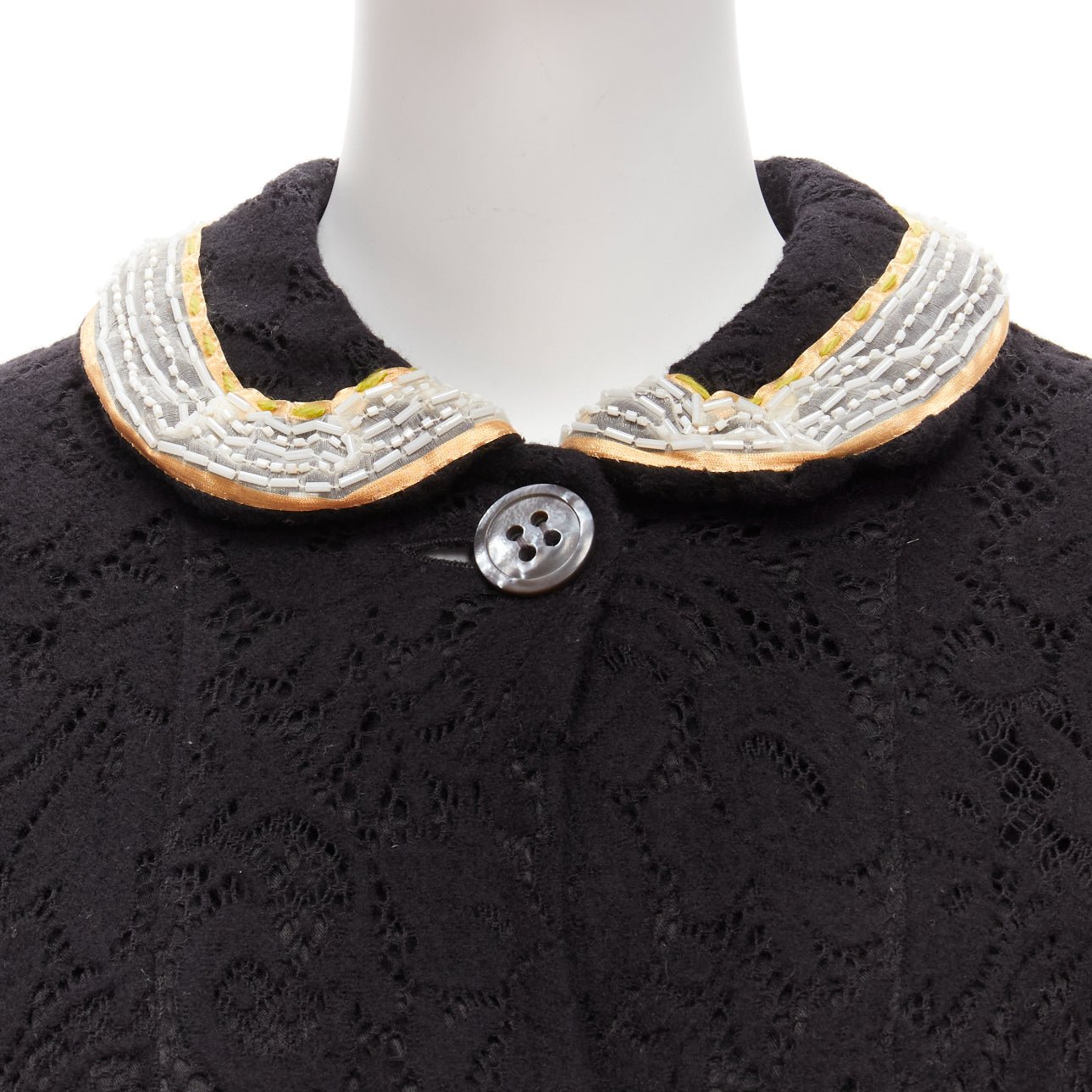 Unsigned / متعددة Floral Wool Coat - Back view