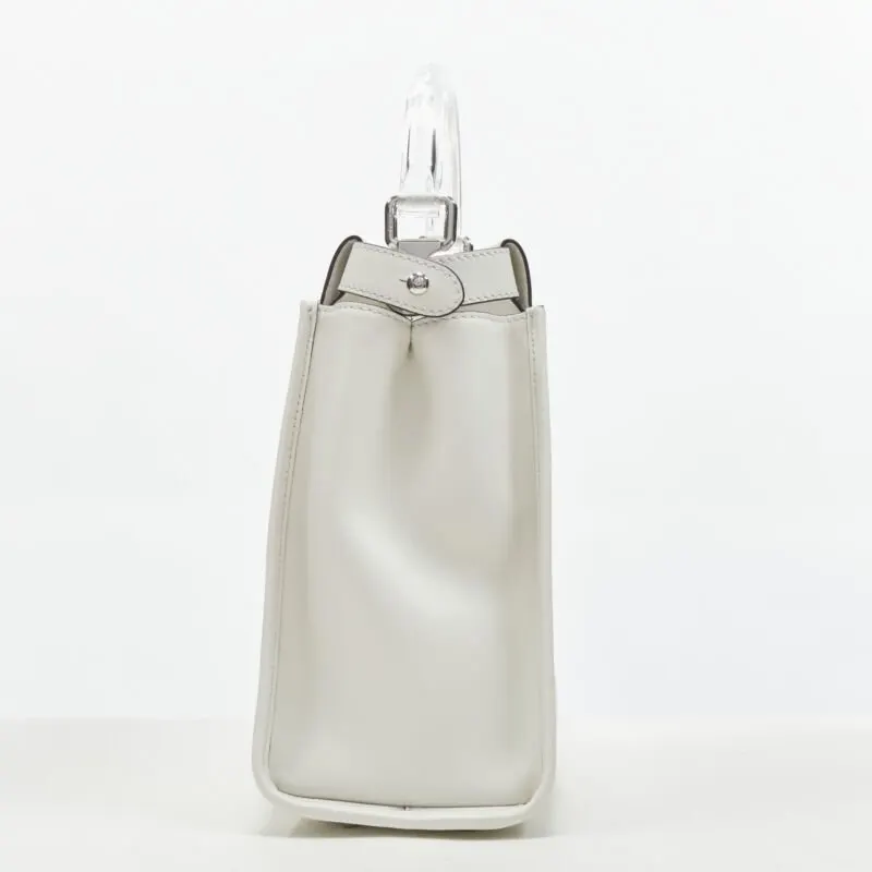 Fendi Supreme Pouchette Bag White Plastic Never worn, with tag - Model View