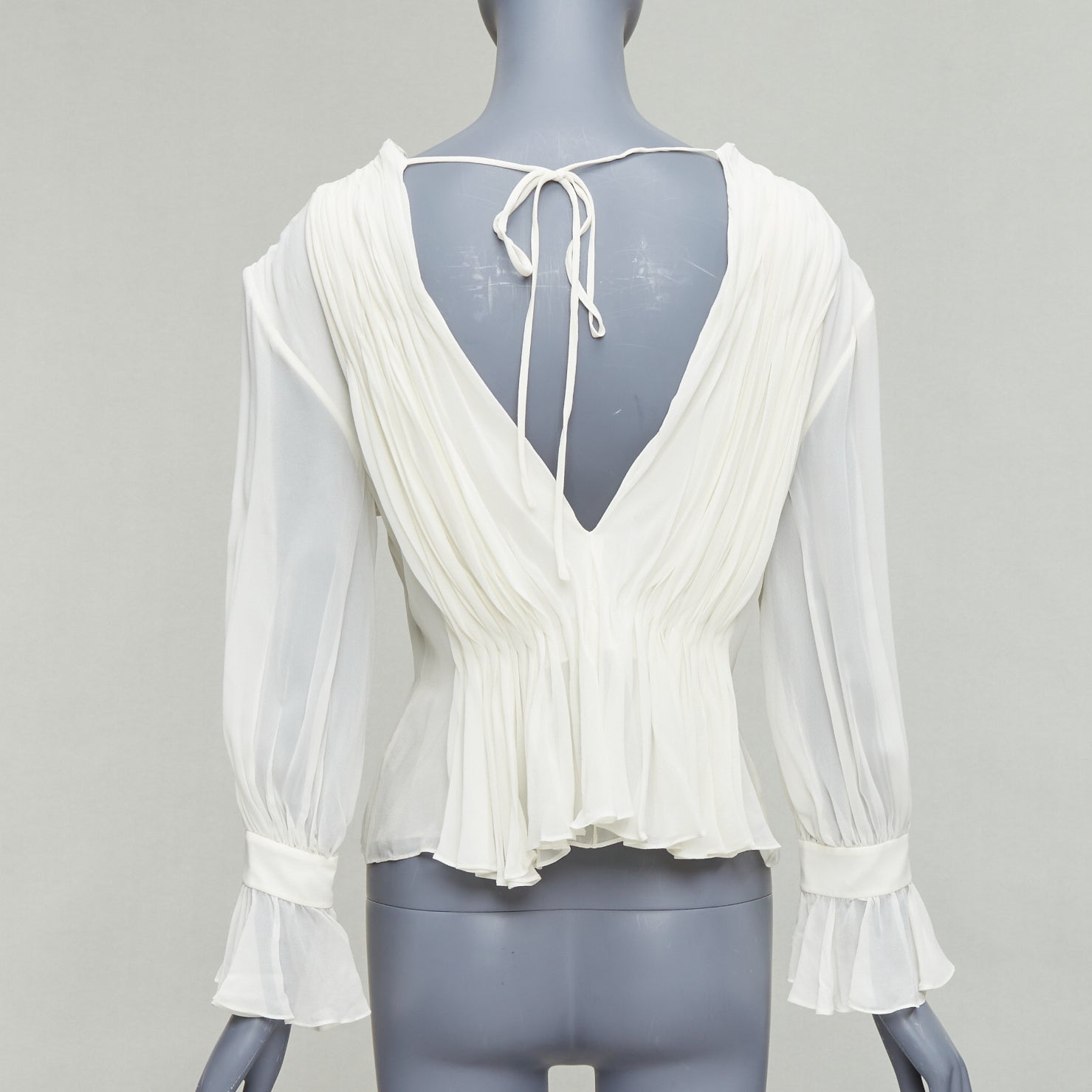 Khaite Carlin - Side view