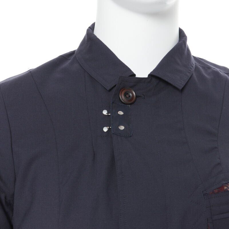 Takahiromiyashita The Soloist Navy Curved Seams Coat - Back view