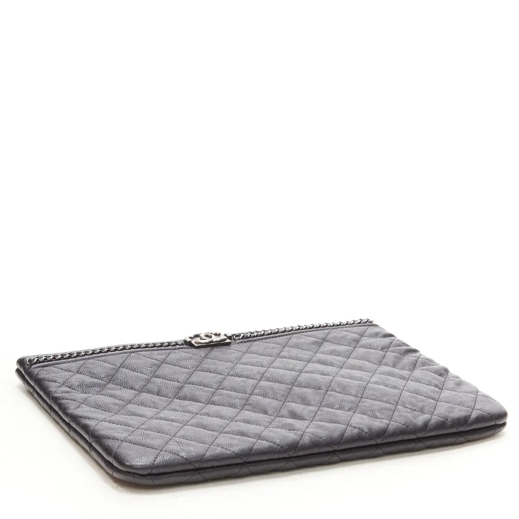 Chanel O Case Black Leather Never worn - Model View