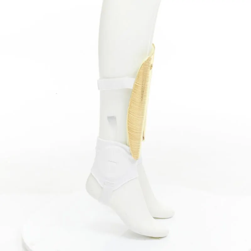 Gucci GG Shin Guards Gold Metal Fair - Model View