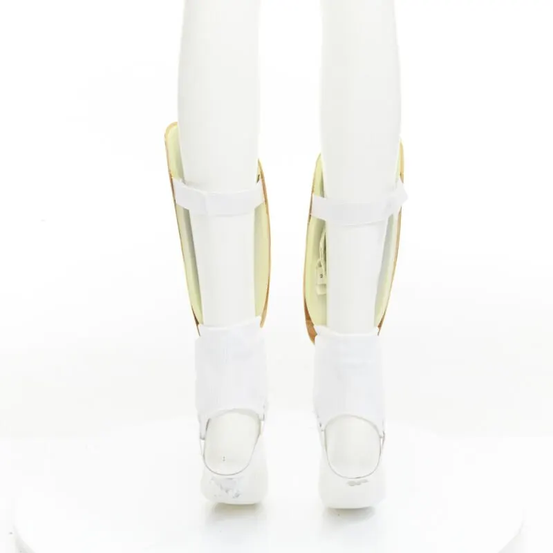 Gucci GG Shin Guards Gold Metal Fair - Box View