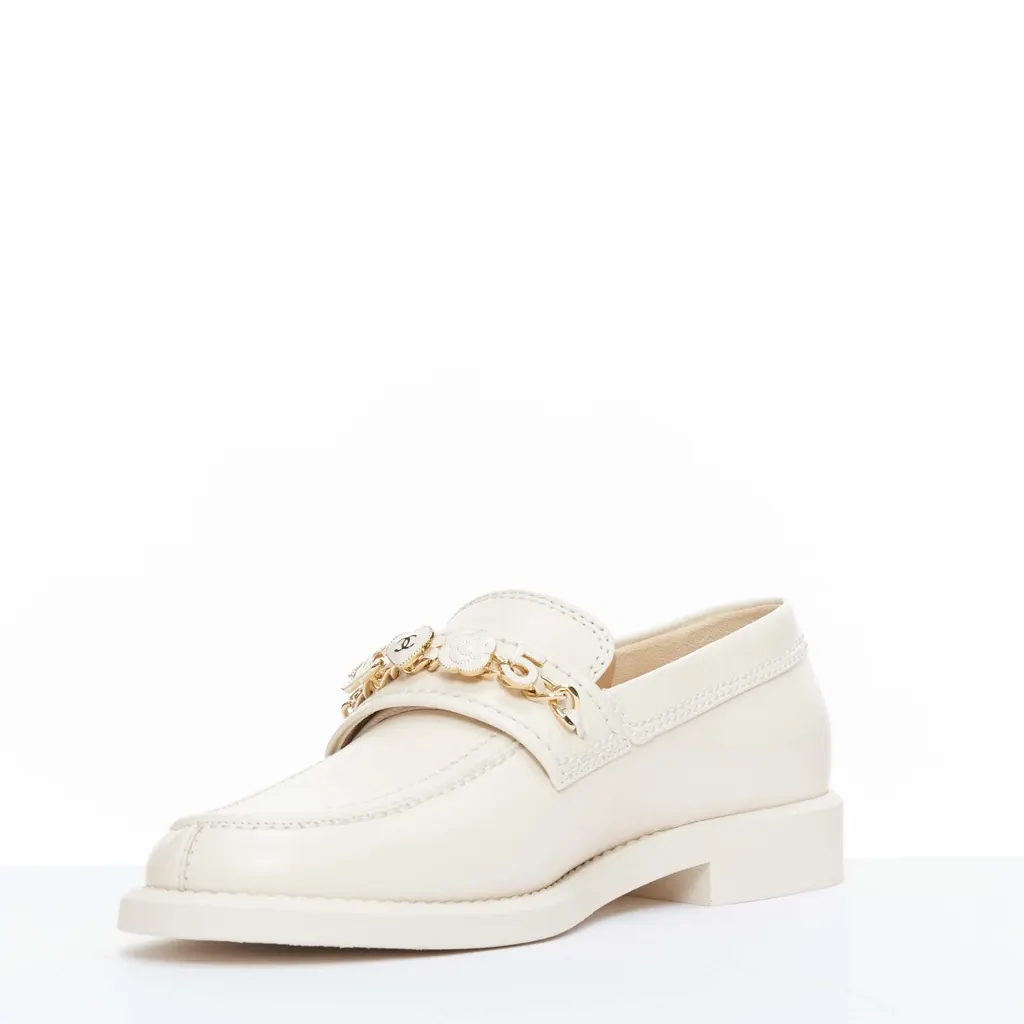Chanel Heart Charm Loafers Beige Leather Never worn, with tag - Model View