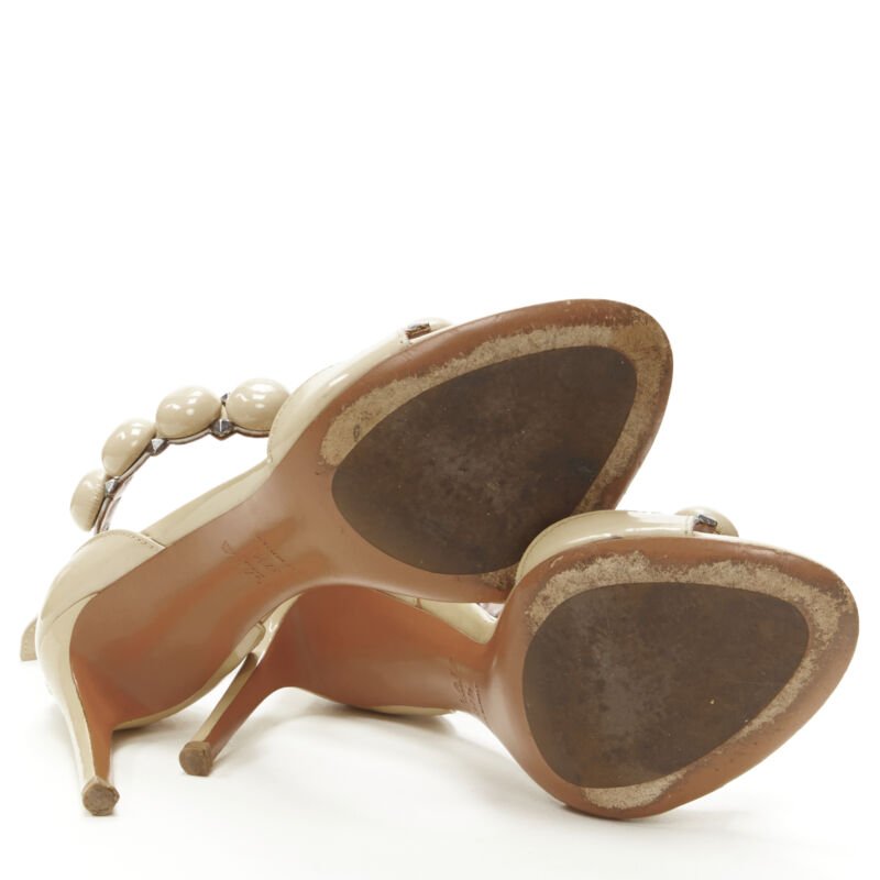Alaïa Studded Patent Sandals - Image 14