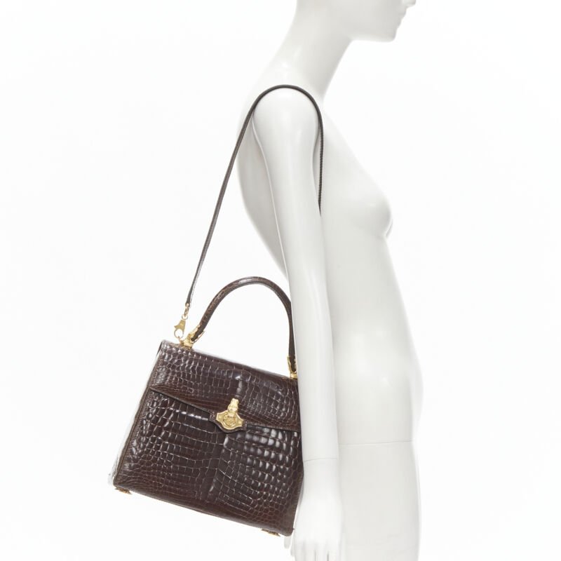 Unsigned / متعددة Polished Leather Bag - Back view