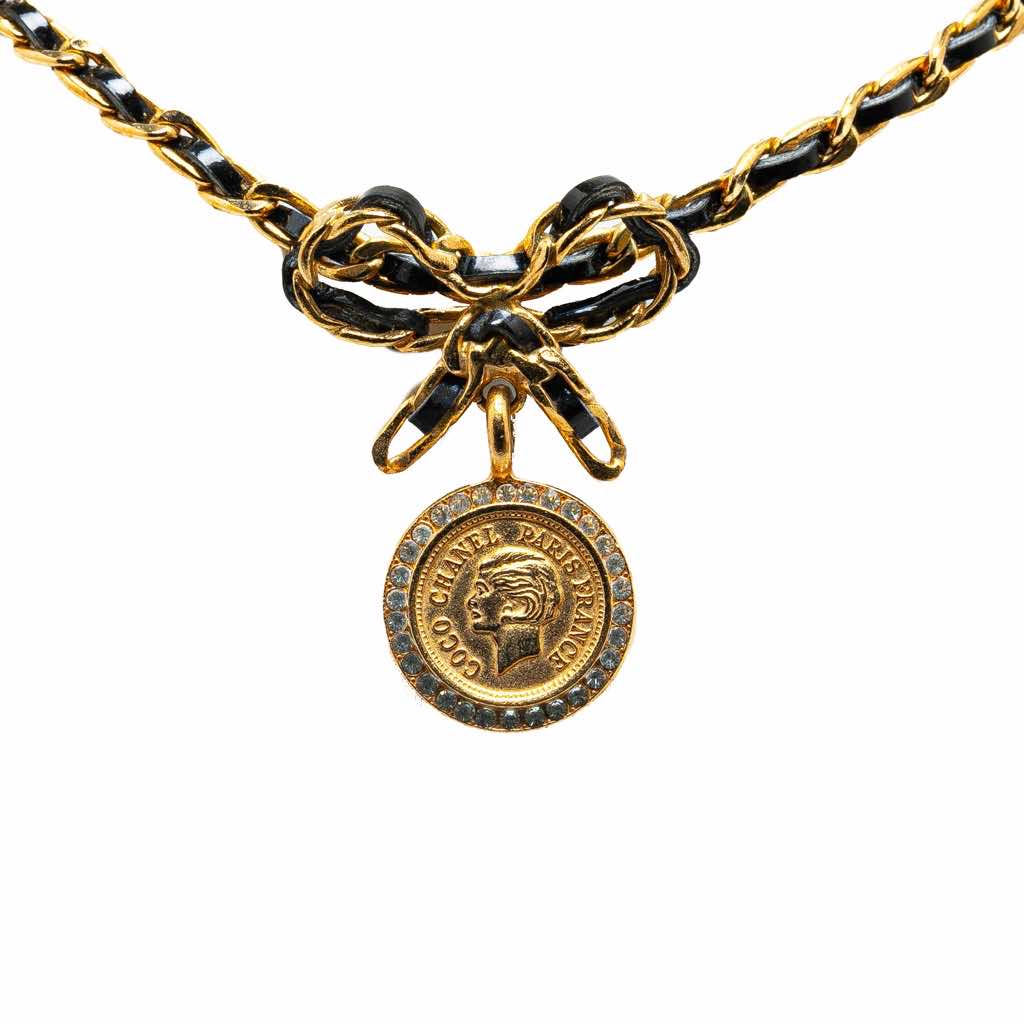 Chanel Leather and Gold Plated Medallion Bow Pendant Necklace