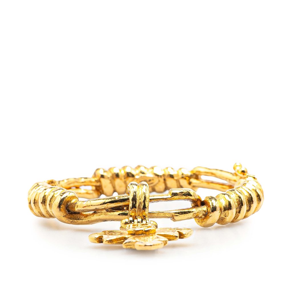 Chanel Gold Plated CC Engraved Cross Bracelet