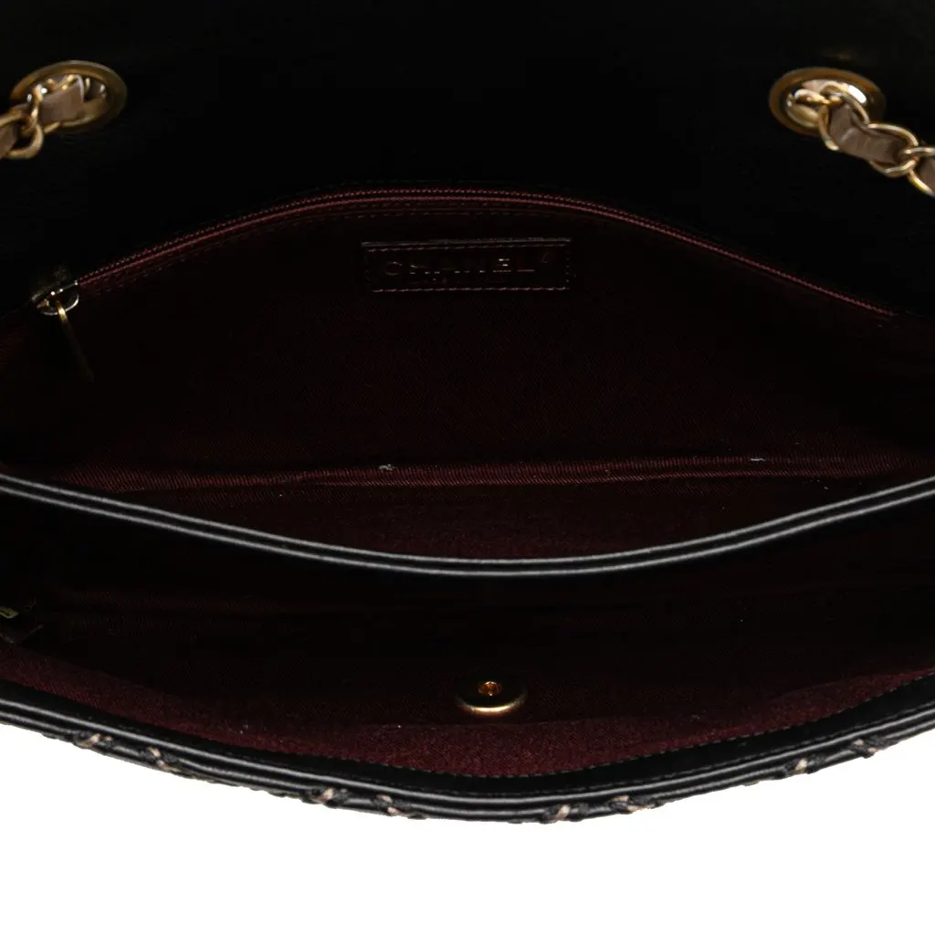 Chanel Paris Dallas Quilted Calfskin Chic Stitch Flap Black Leather Good - Model View
