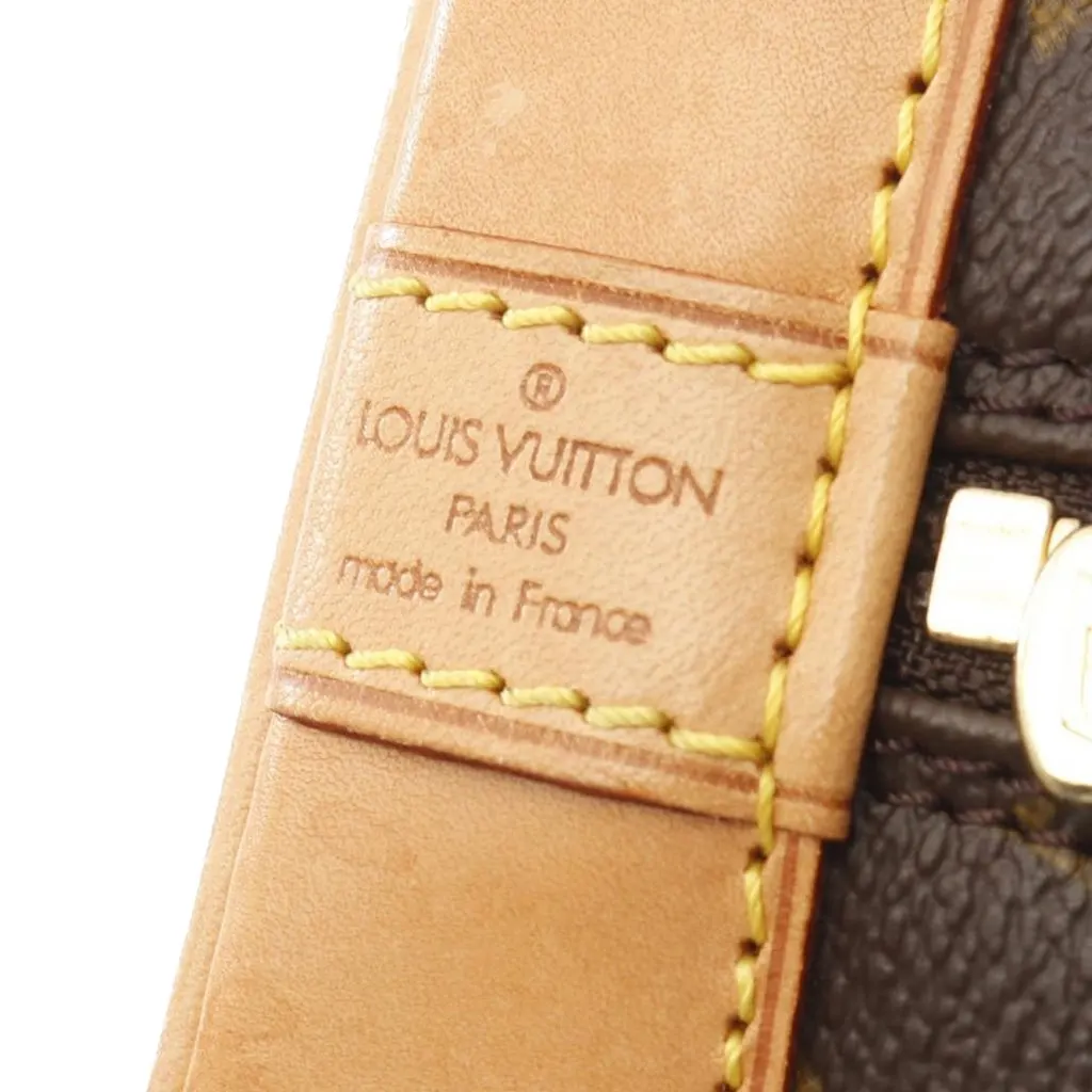 Louis Vuitton Monogram Alma PM Brown Canvas Good - Model View