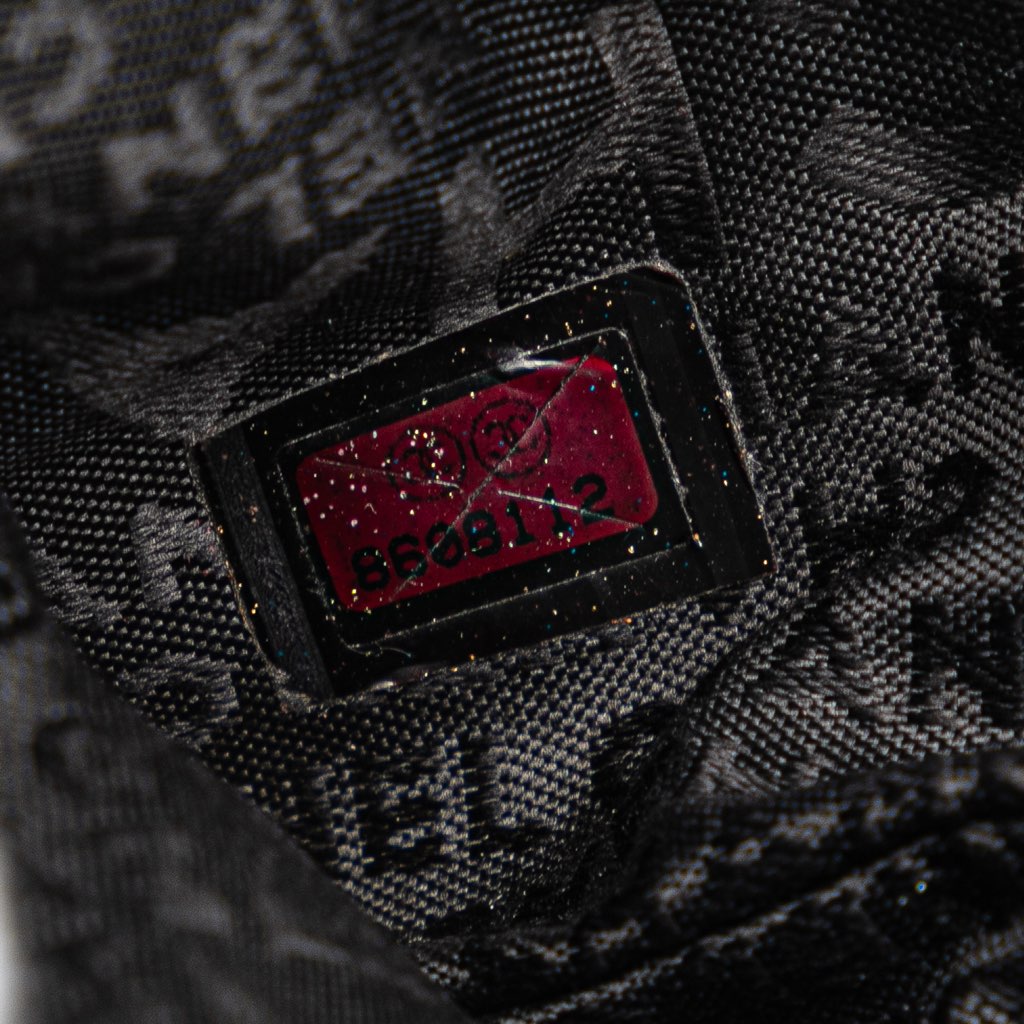 Chanel Embossed Lambskin Camellia Chain Pochette - Detail 1