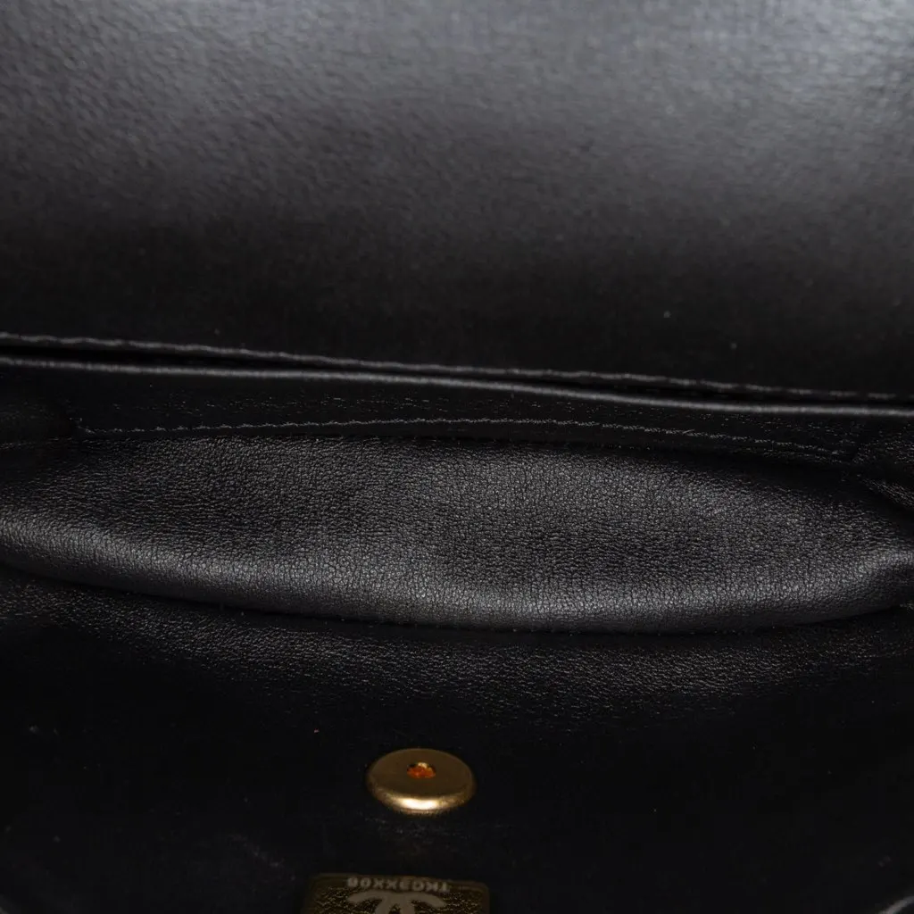 Chanel Mini Rectangular Quilted Lambskin Heart Charms Flap Black Leather Good - Model View