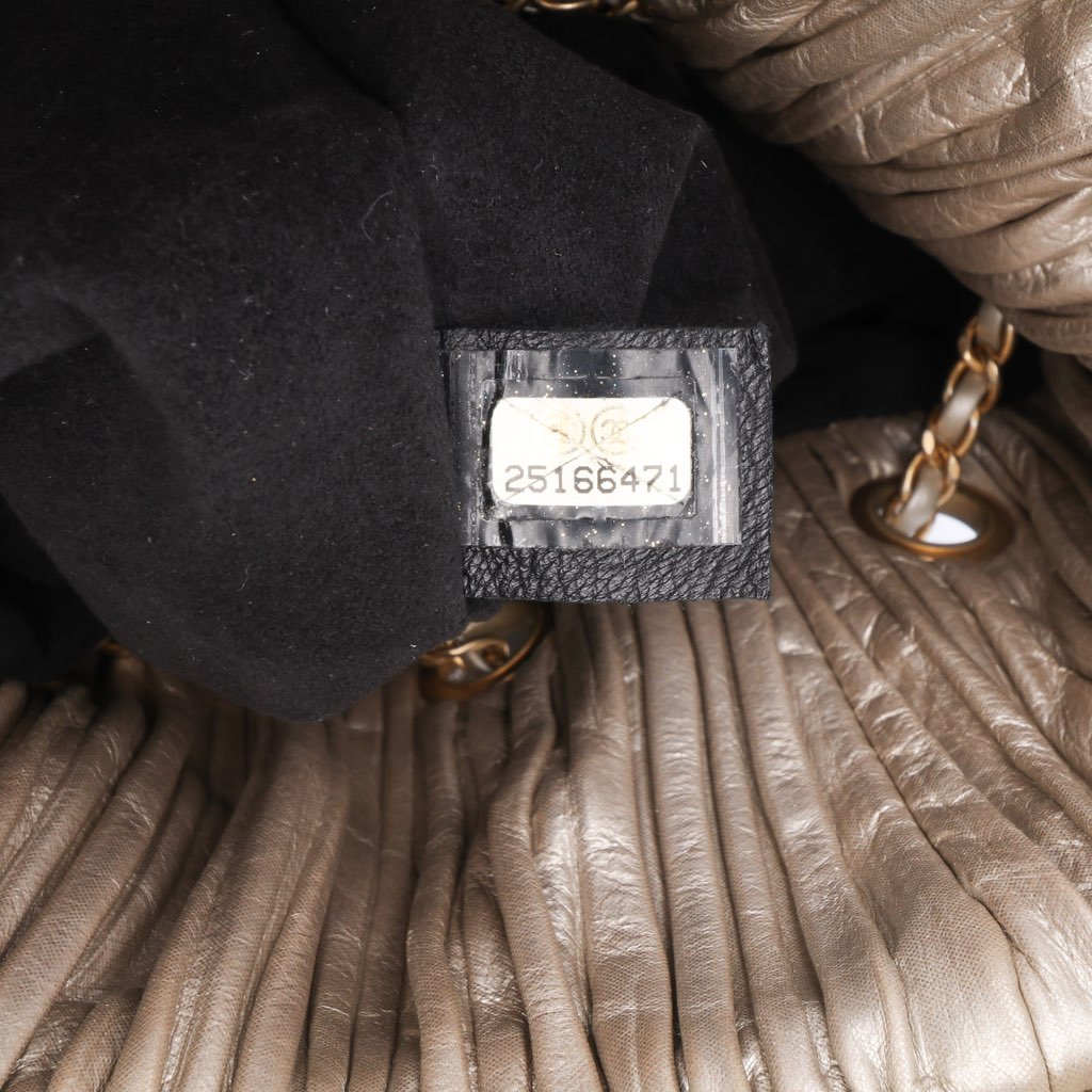 Chanel Medium Metallic Calfskin Coco Pleats Drawstring Backpack - Detail 1