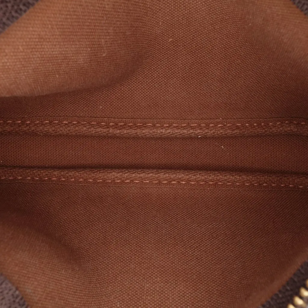 Louis Vuitton Monogram Mini Pochette Accessoires Brown Canvas Good - Model View