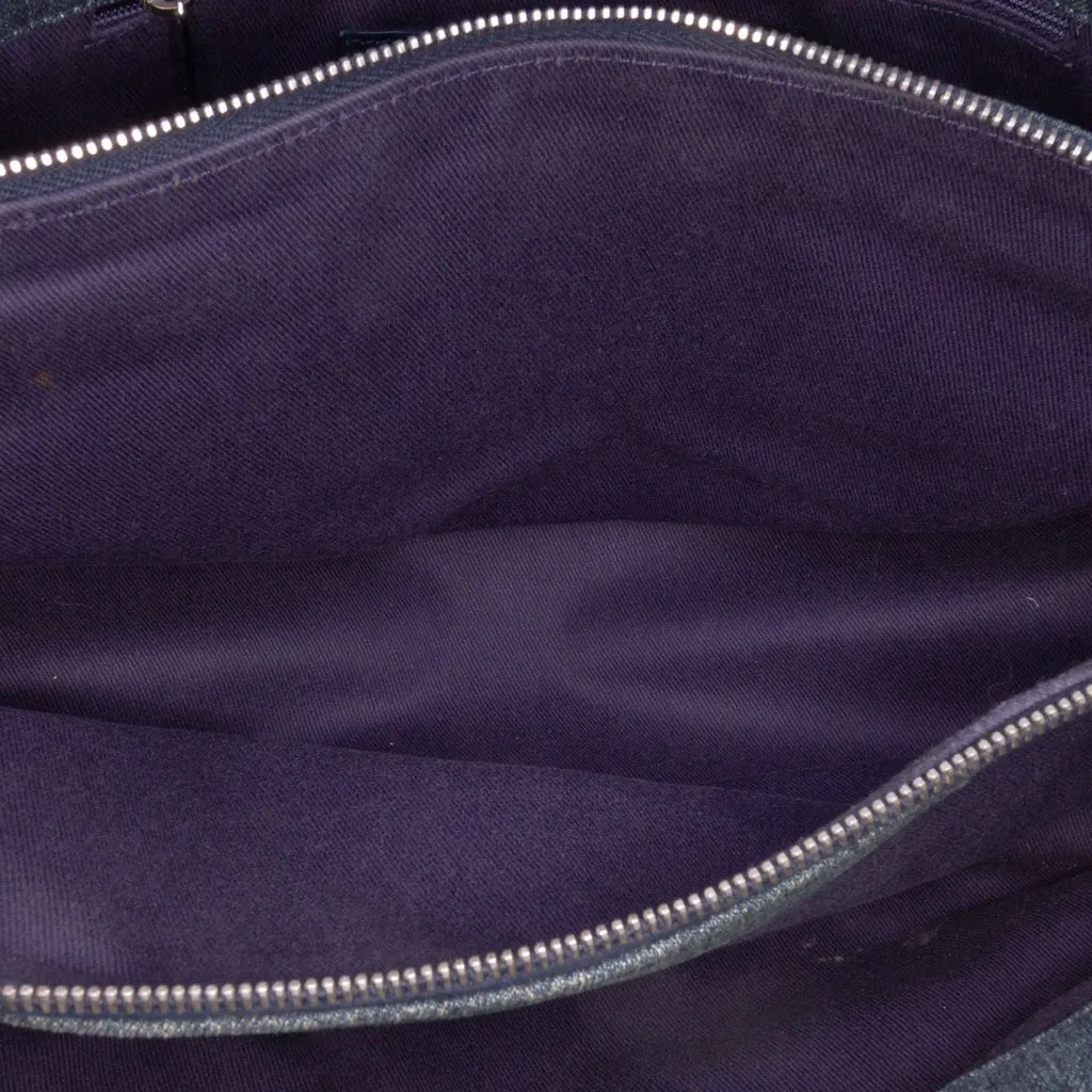 Chanel Denim Camellia Embroidered Shopping Tote Blue Denim Good - Model View
