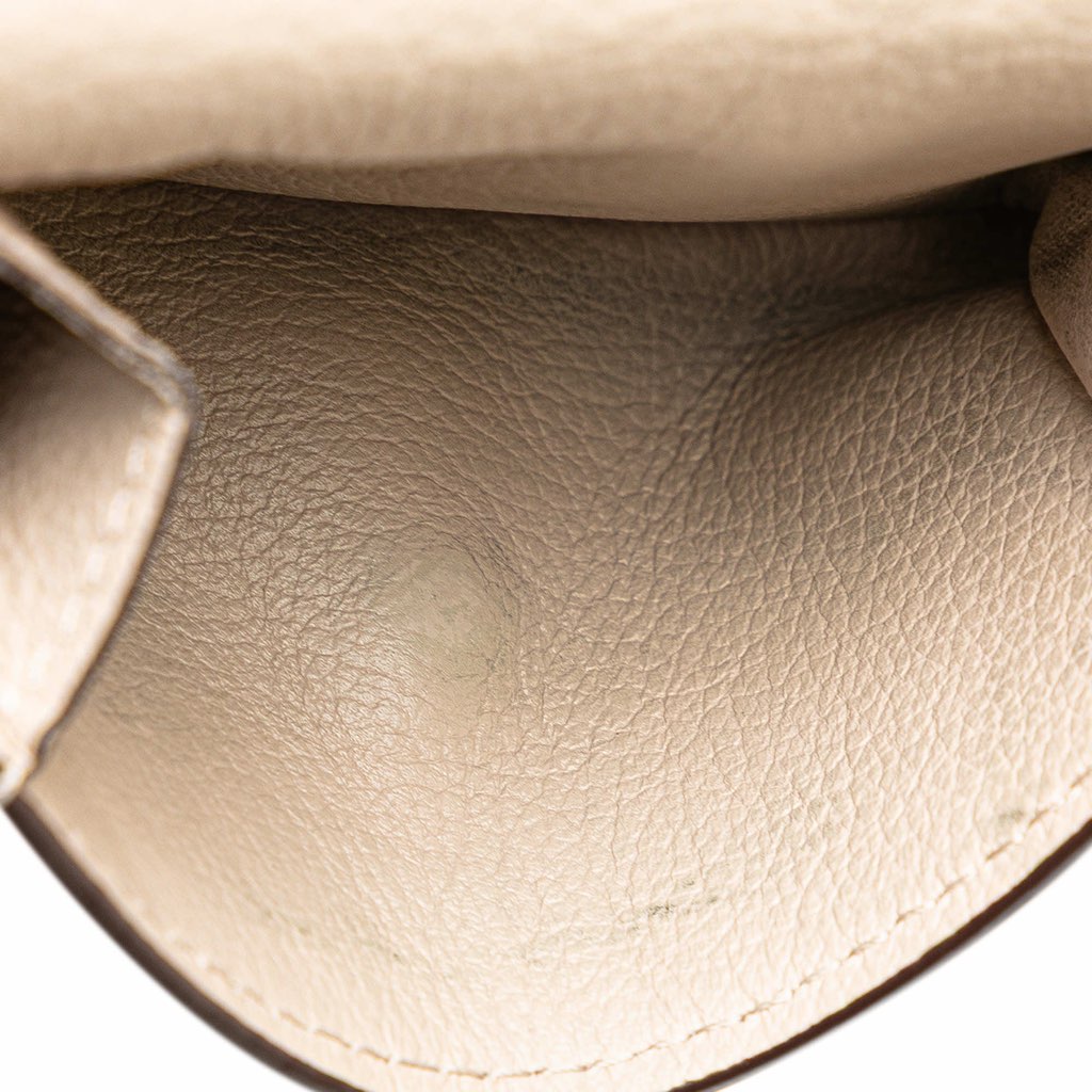 Louis Vuitton Leather Lockmini Compact Wallet - Side view