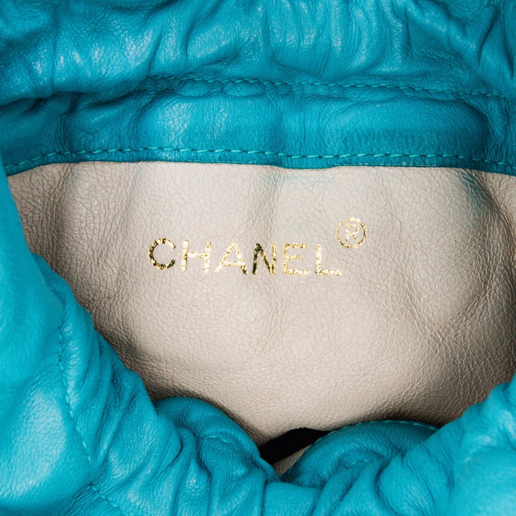 Chanel Quilted Lambskin Drawstring Tassel Bucket Bag - Side view
