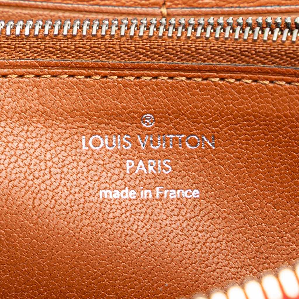 Louis Vuitton Leather Articles de Voyage Zippy Long Wallet - Side view
