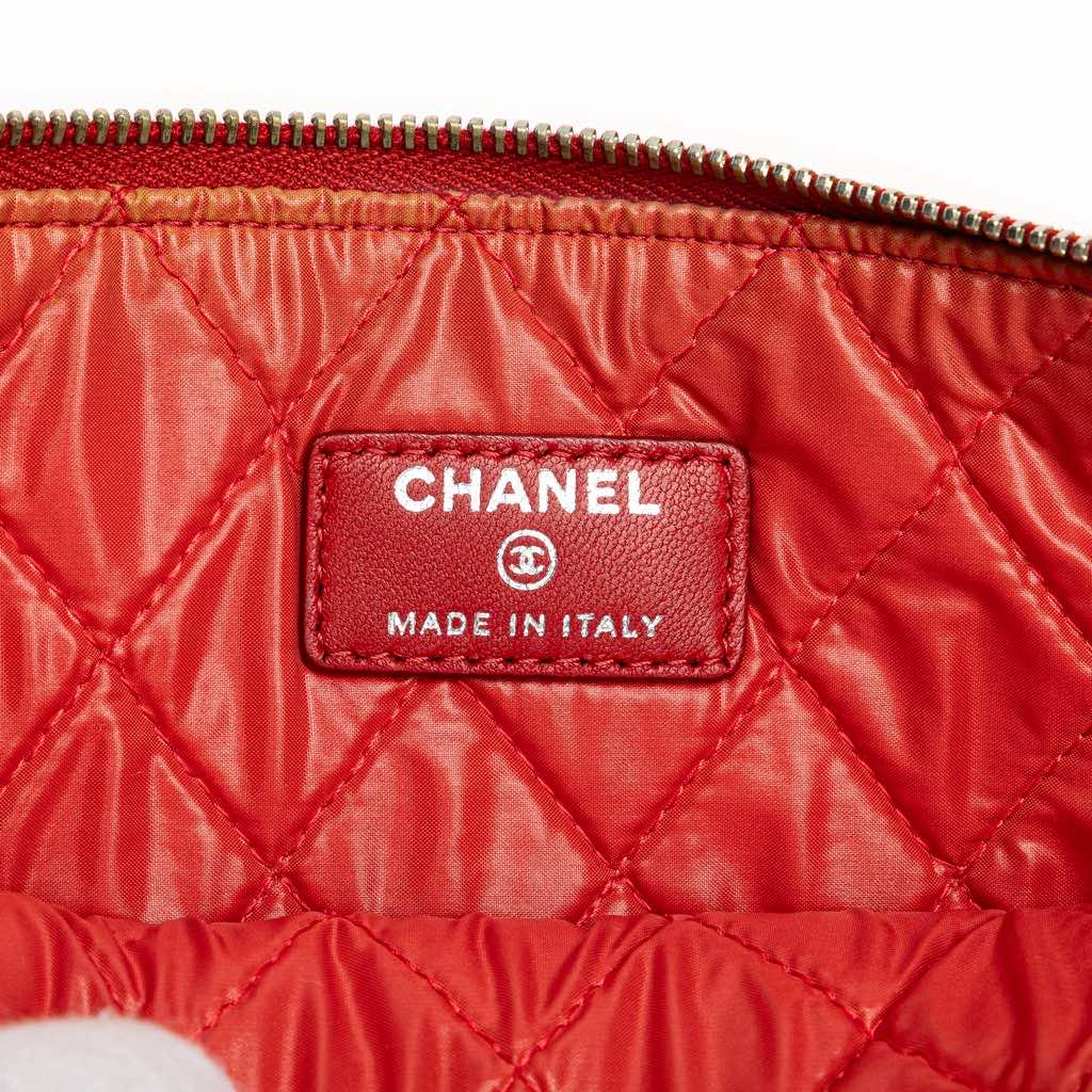 Chanel Medium Quilted Lambskin O Case Clutch - Side view