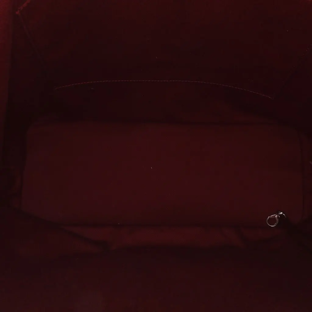 Chanel Large Calfskin Coco Eyelets Shopping Tote Red Leather Good - Model View