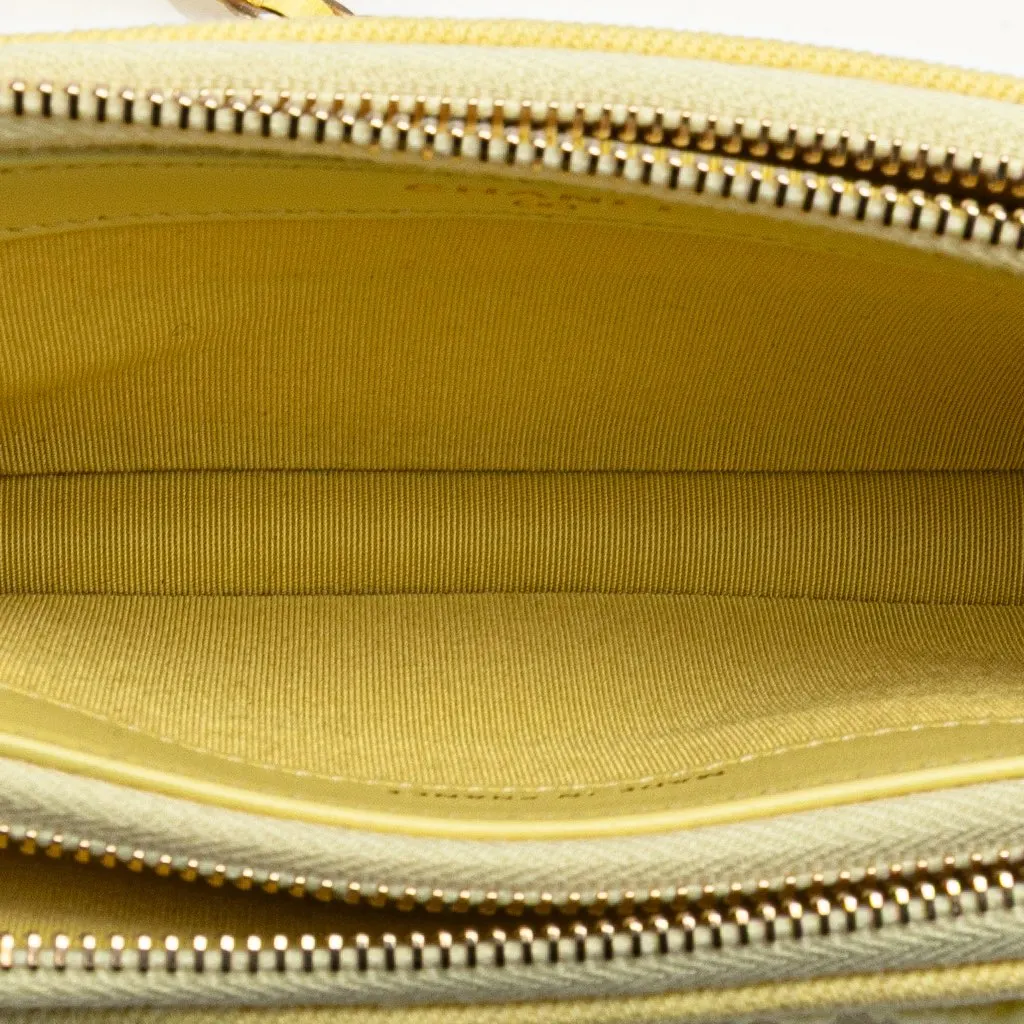 Chanel Denim Coco Fringe Double Zip Clutch with Chain Yellow Denim Good - Model View