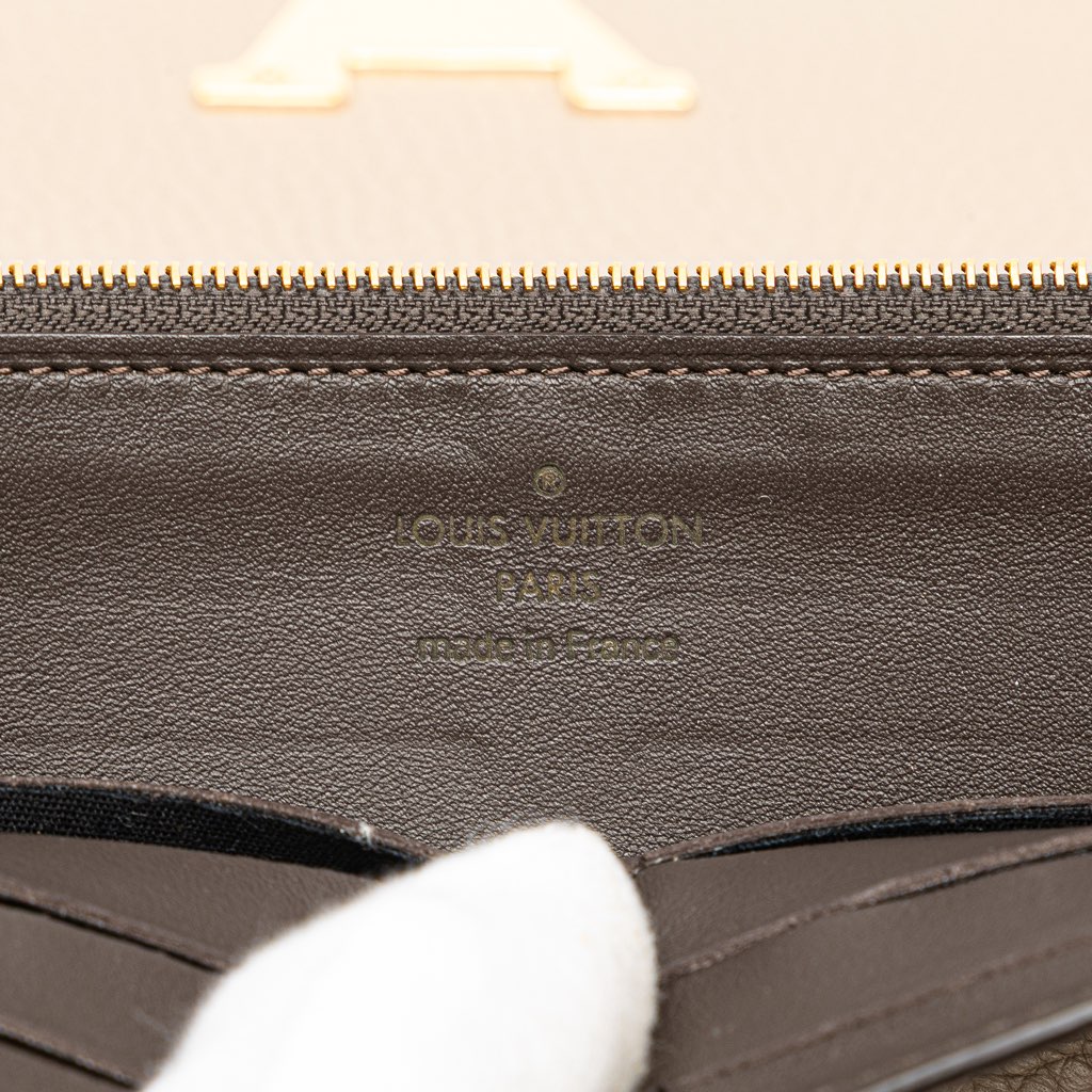 Louis Vuitton Taurillon Capucines Wallet - Side view