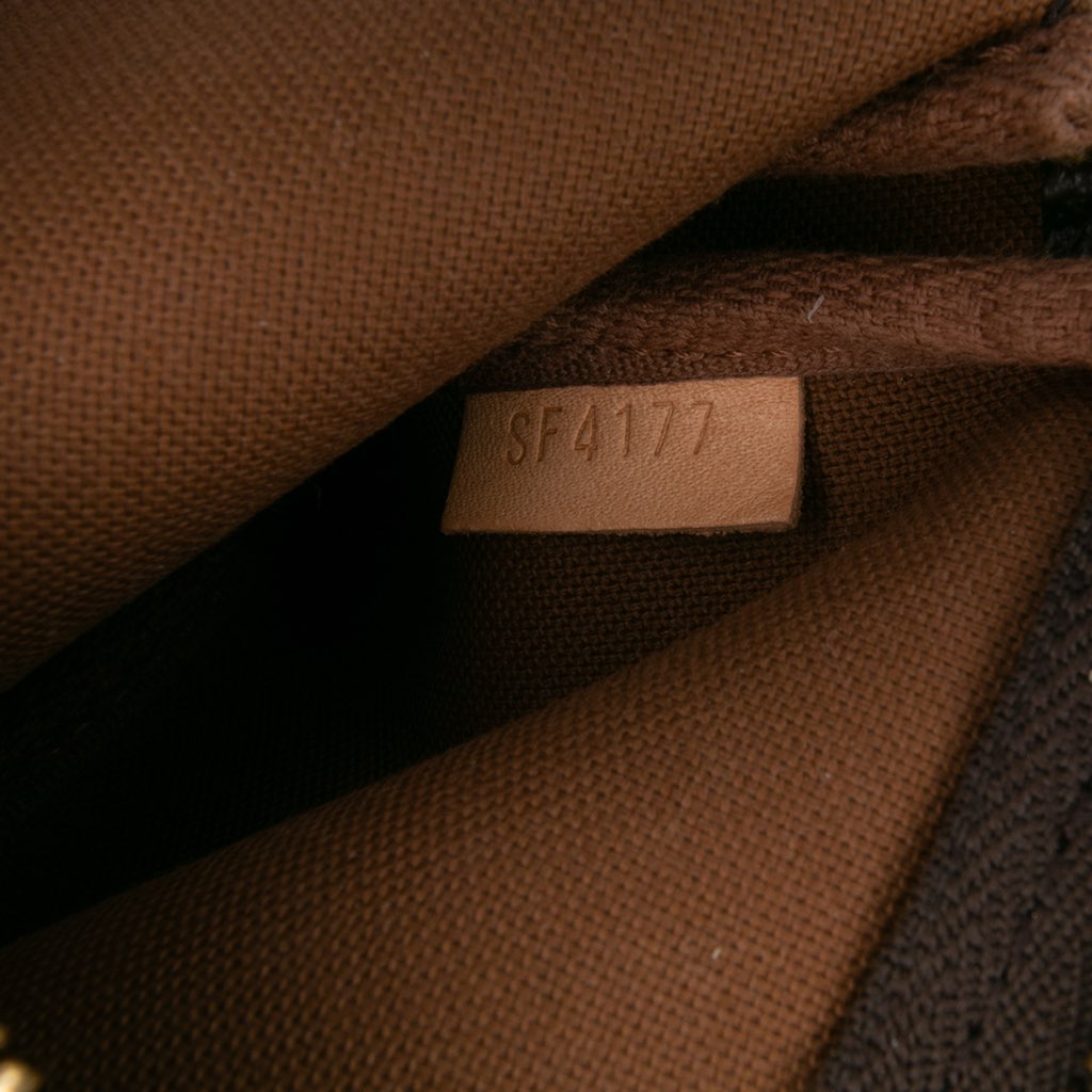 Louis Vuitton Monogram Mini Pochette Accessoires - Detail 1