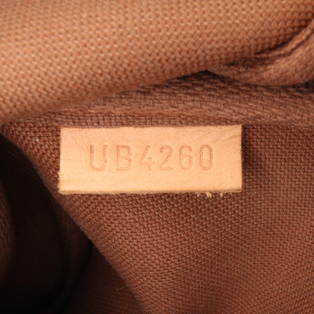 Louis Vuitton Monogram Mini Pochette Accessoires - Detail 1