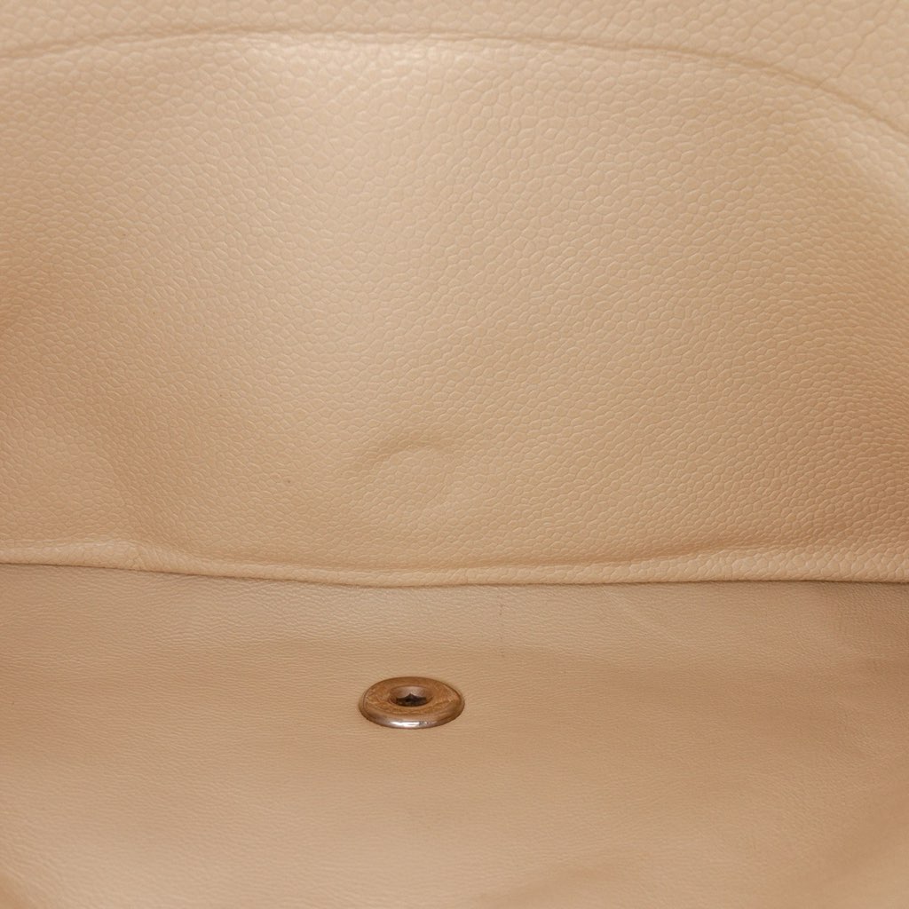 Chanel Maxi Classic Caviar Double Flap - Side view