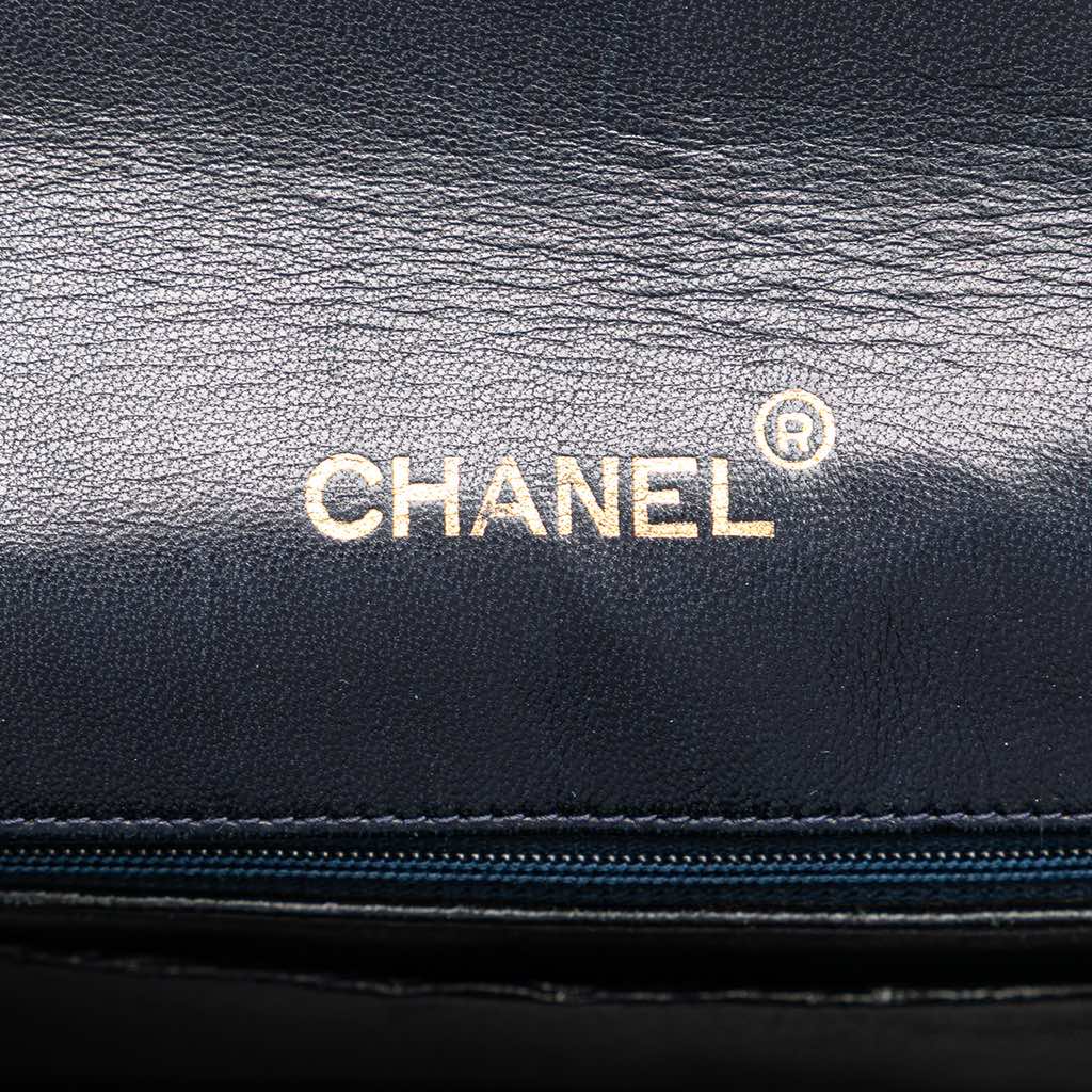 Chanel CC Quilted Lambskin Round Flap - Side view