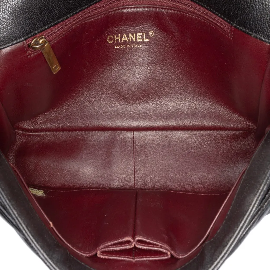 Chanel Medium Diagonal Quilted Goatskin Flap Black Leather Good - Model View