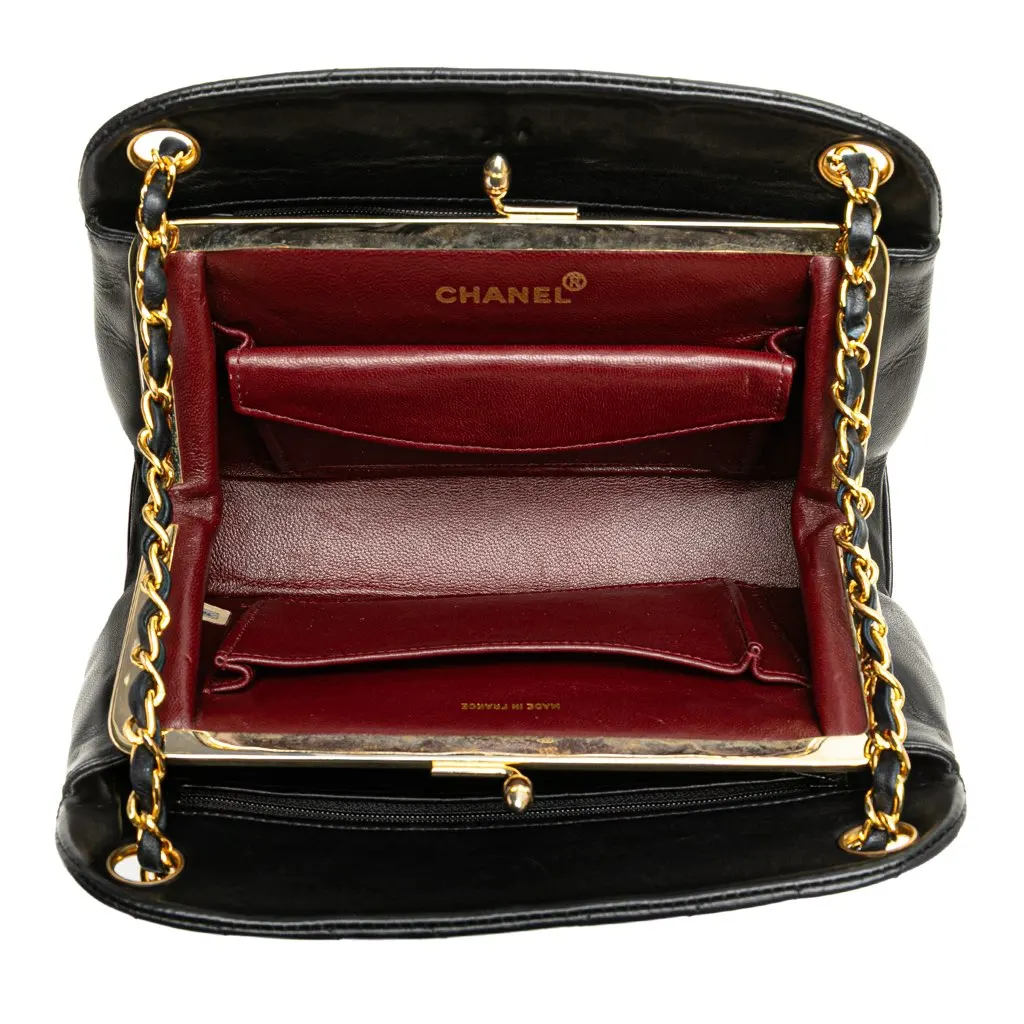 Chanel CC Chevron Quilted Lambskin Kiss Lock Shoulder Bag Black Leather Good - Model View