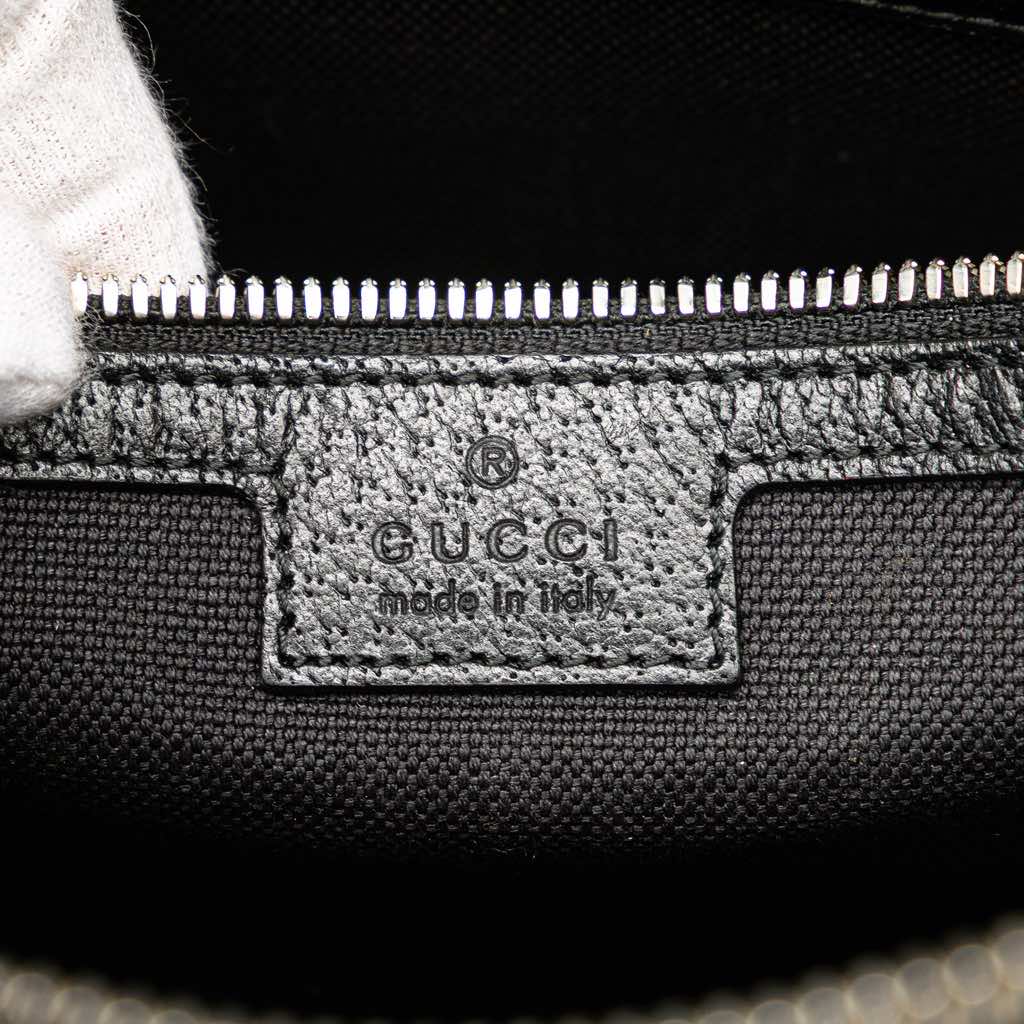 Gucci Jumbo GG Canvas Clutch on Strap - Side view