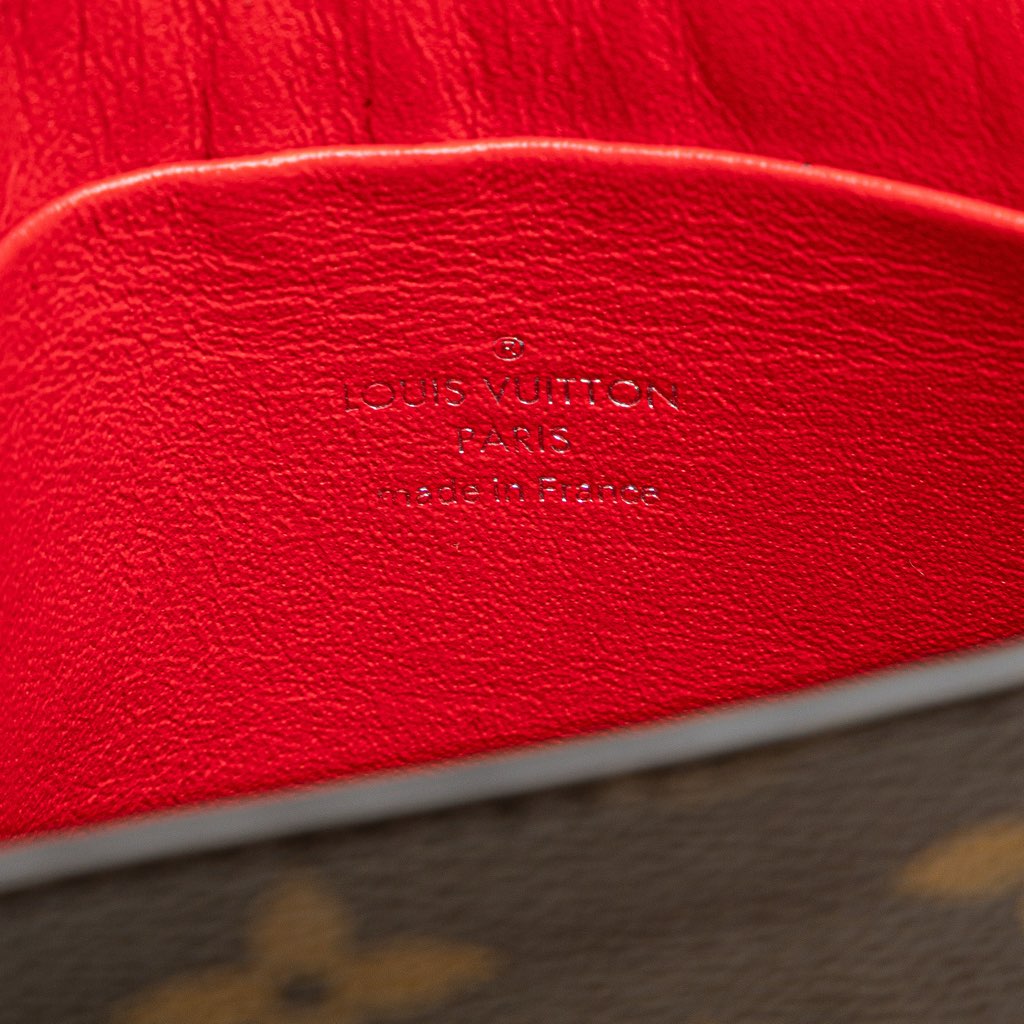 Louis Vuitton Monogram Tribal Mask Pochette PM - Side view