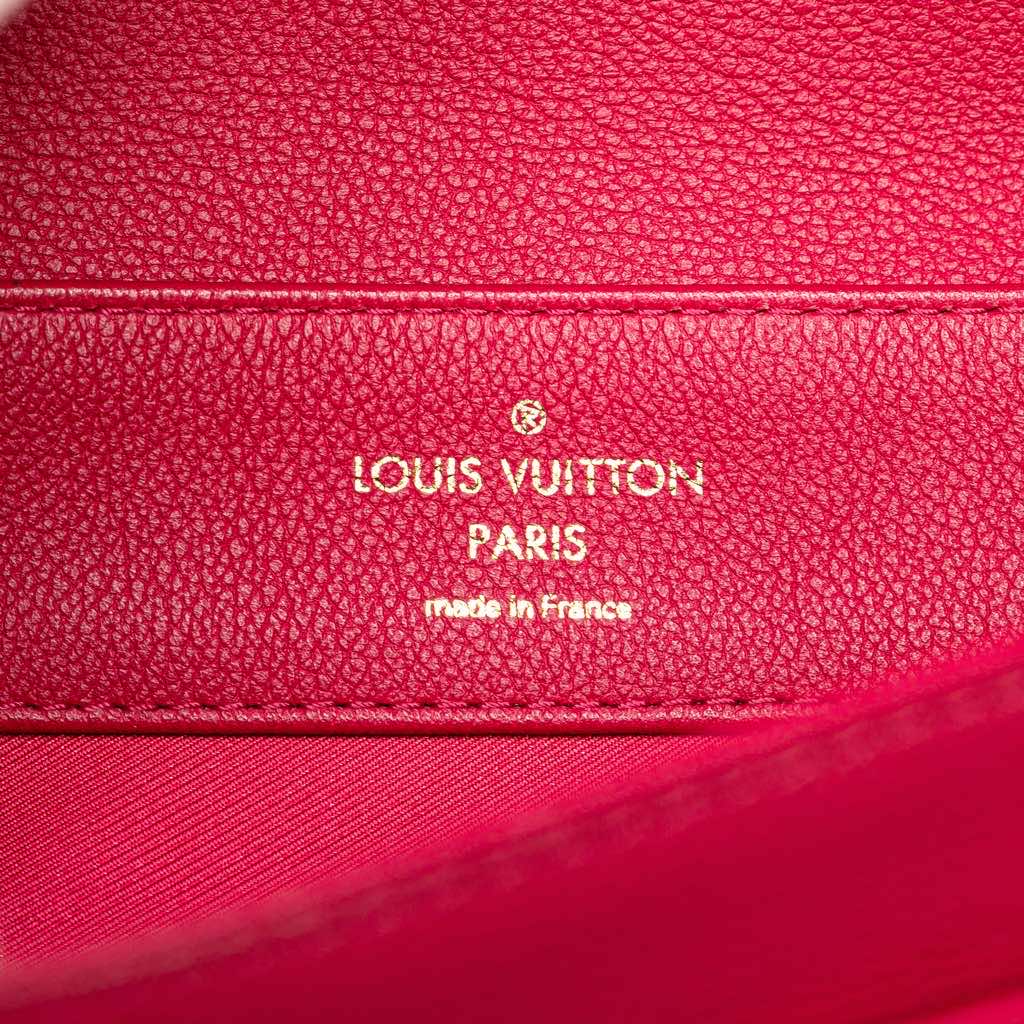 Louis Vuitton Calfskin Lockme PM - Side view