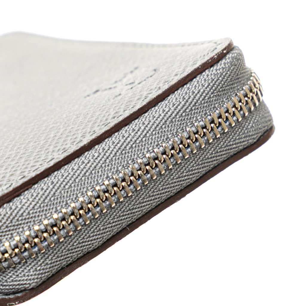 Louis Vuitton Taiga Zippy Vertical Coin Purse - Image 11