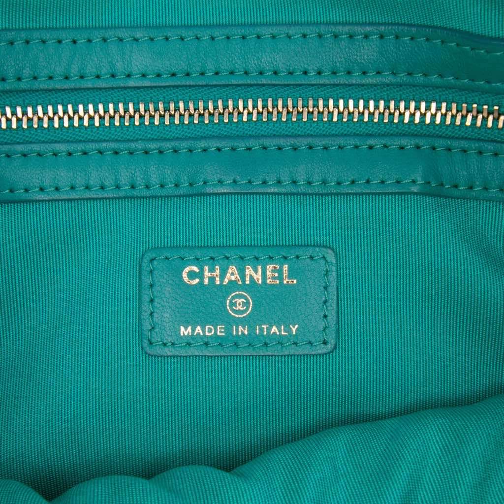 Chanel Medium Quilted Lambskin O Case Clutch - Side view